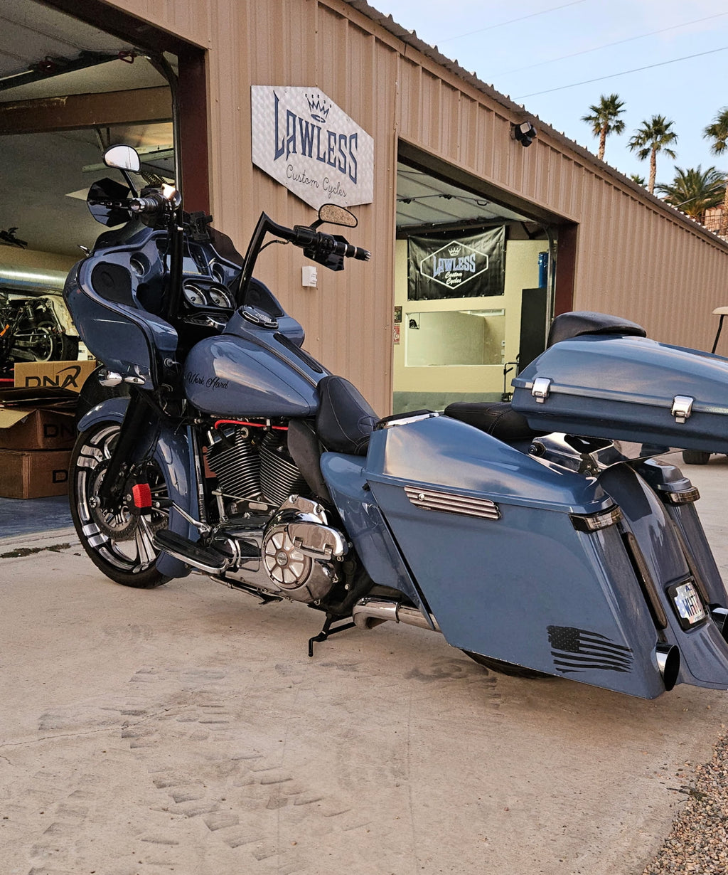 LawlessCC center stand installed on a Harley Touring motorcycle with air ride suspension.