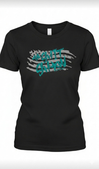 Black t-shirt with gray American flag and teal text 'The Shit Show'. design on the front