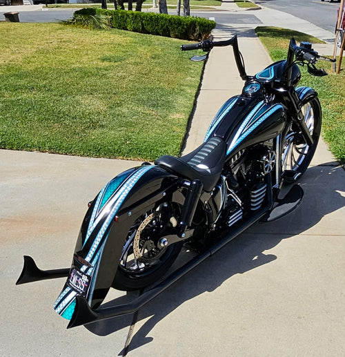 Black El Jefe upsweep exhaust on a Lawless CC custom build Softail motorcycle. El Jefe exhaust is available exclusively thru Lawless Custom Cycles